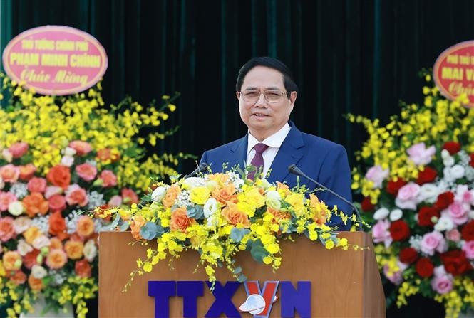 越共中央政治局委员、政府党委书记、政府总理范明政发表讲话。图自越通社