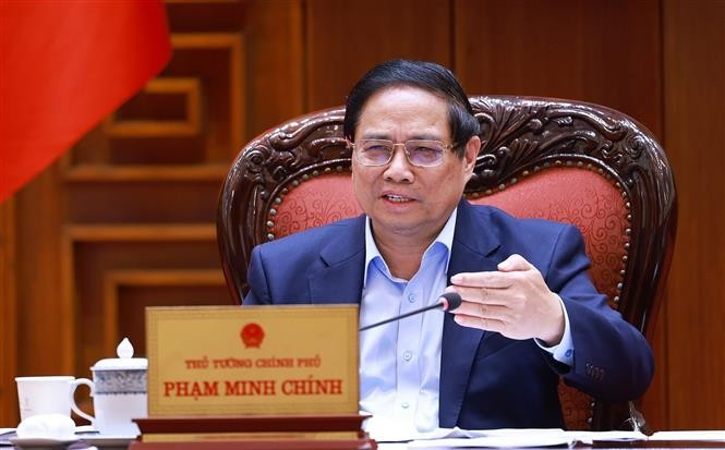 越南政府总理范明政发表讲话。图自越通社