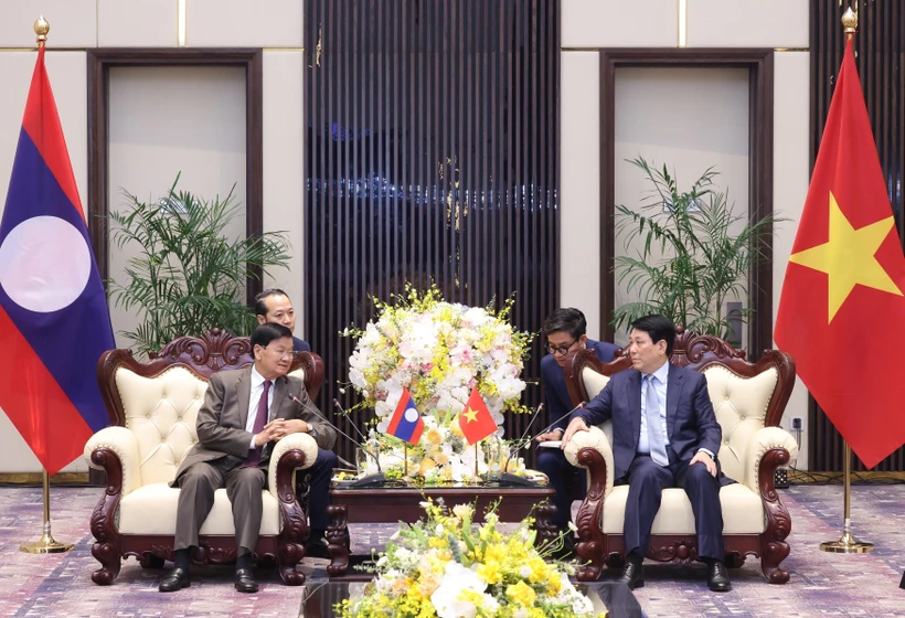 越南国家主席梁强会见老挝总书记、国家主席通伦·西苏里。图自越通社