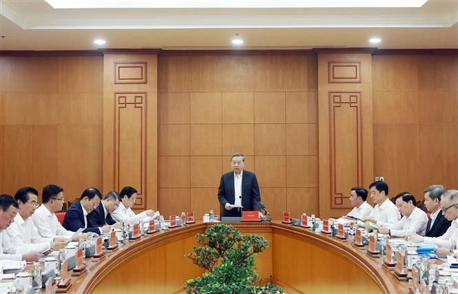 会议场景。图自越通社