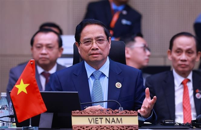 越南政府总理范明政出席会议。图自越通社