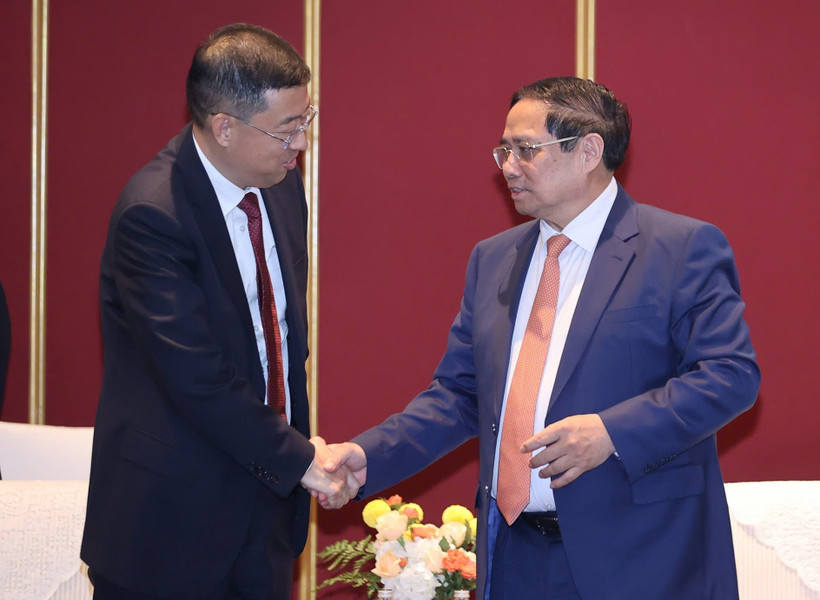 越南政府总理范明政与中国银行（BOC）董事长葛海蛟。图自越通社