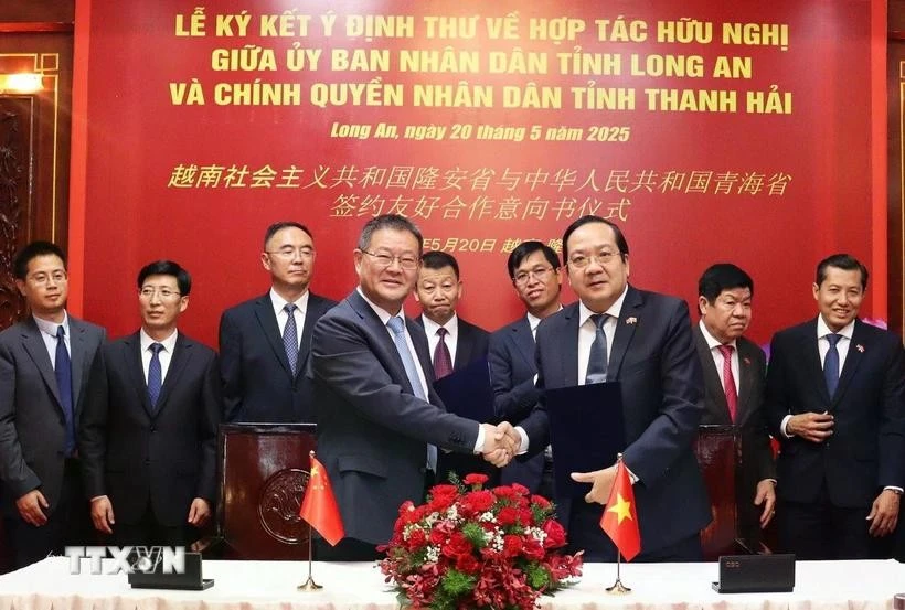 签约仪式。图自越通社