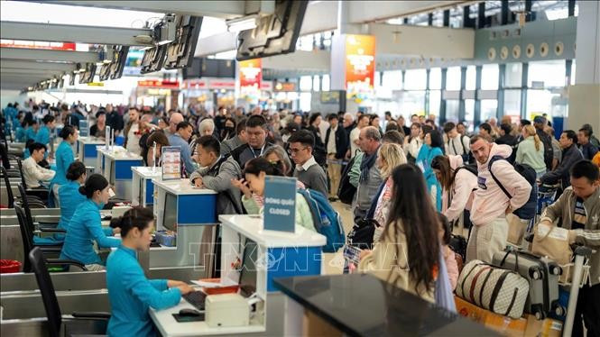 内排机场T1航站楼越南航空值机区。图自越通社