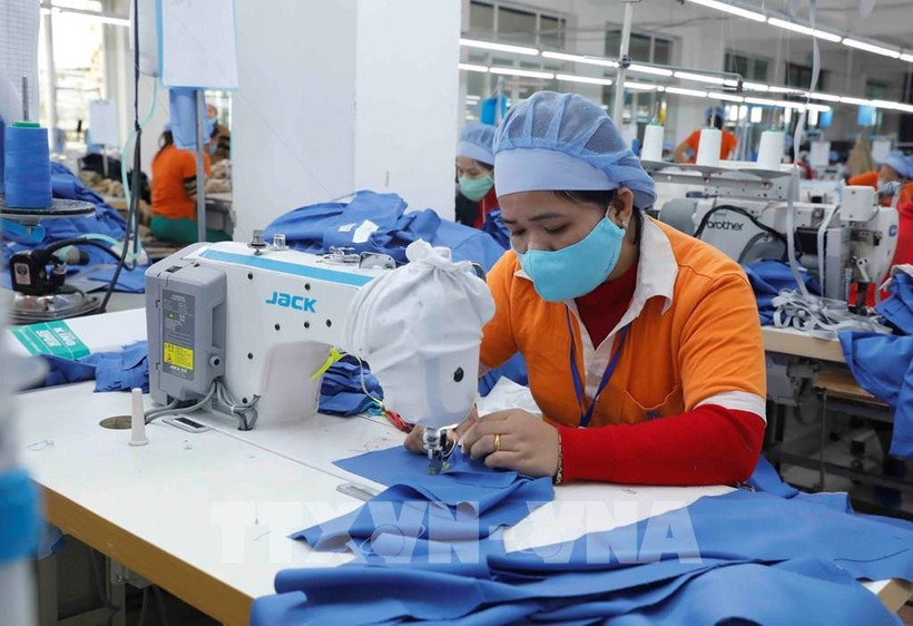 兴越纺织公司纺织厂。图自越通社
