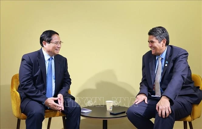 范明政总理会见帕劳总统。图自越通社