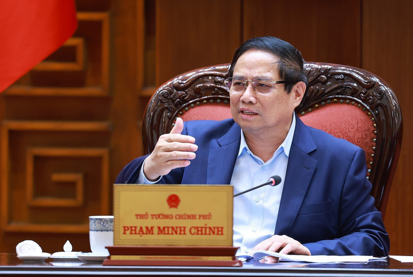 政府总理范明政发表讲话。图自越通社