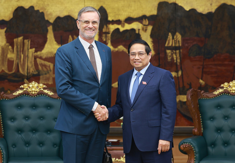 政府总理范明政会见法国驻越南大使。图自越通社