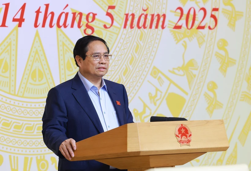 政府总理范明政发表讲话。图自越通社