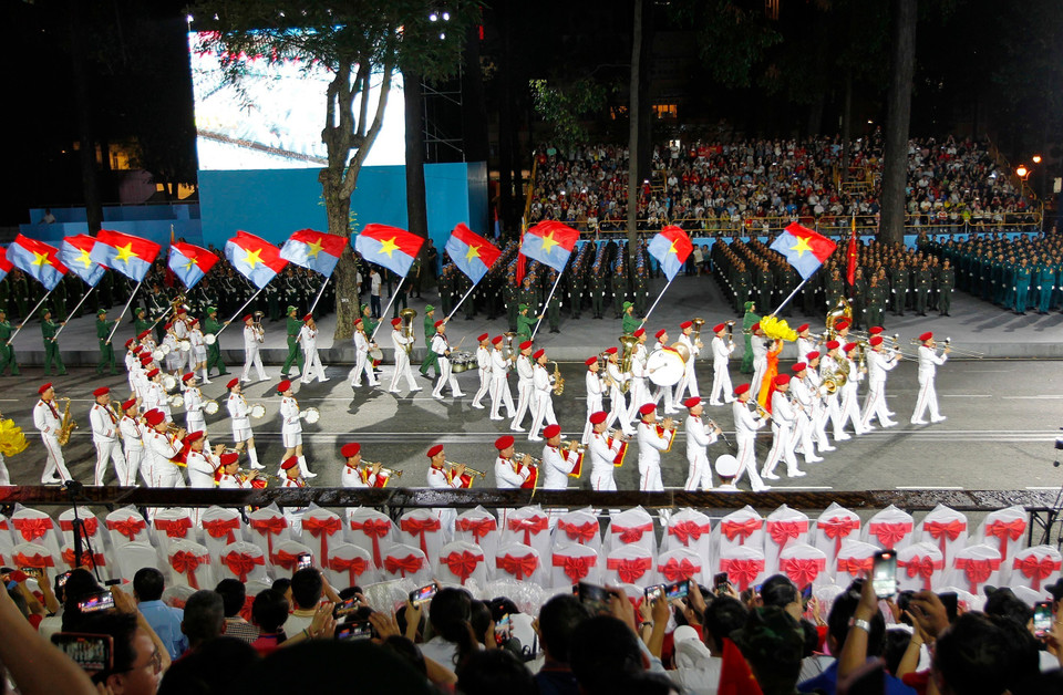 人民警察学院鼓队参加庆典的阅兵游行活动预演。图自 越通社