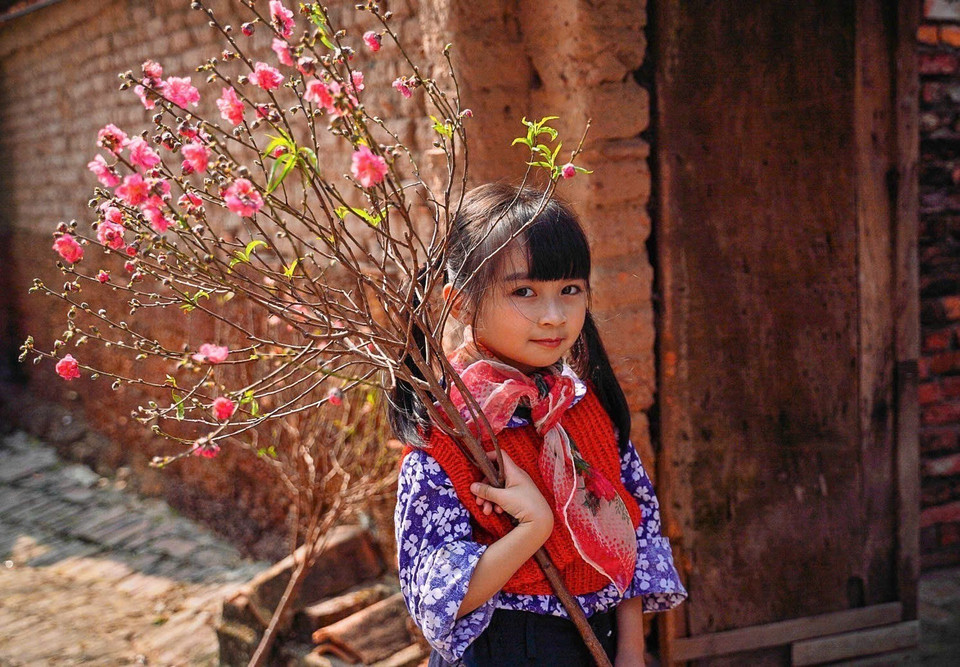 春节往往是孩子们满怀期待、兴奋等待的时刻。图自越通社