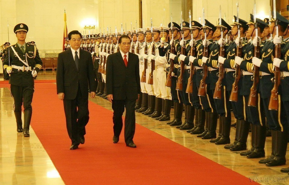 2008年5月,越共中央总书记农德孟访问中国期间,双方决定将越中“全面合作”关系升格为“全面合作伙伴”关系,为两国关系注入强大动力。图自 越通社