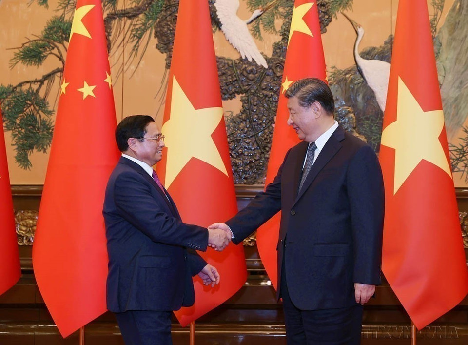 2023年6月27日在北京，越南政府总理范明政会见中共中央总书记、国家主席习近平。图自 越通社