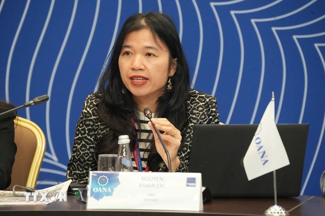 越通社旗下的越南新闻报时政新闻部主任阮庆枝在第十九届亚太通讯社大会上发表专题报告。图自 越通社