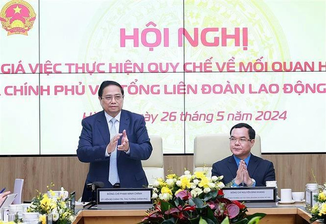 越南政府总理范明政出席会议。图自越通社 vna-potal-thu-tuong-du-hoi-nghi-danh-gia-viec-thuc-hien-quy-che-cong-tac-giua-chinh-phu-voi-tong-ldld-viet-nam-7396085-2009.jpg.webp