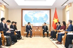 双方会见现场。图自越通社