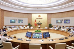 会议场景。图自越通社