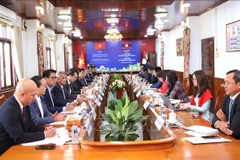 加强越老两党党建合作