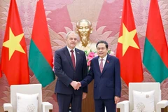 越南国会主席陈清敏与白俄罗斯国民会议代表院主席伊戈尔·谢尔盖延科。图自越通社