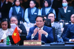 越南政府总理范明政在会上发言。图自越通社