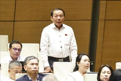 越南文化体育与旅游部长阮文雄在会上发表意见。图自越通社