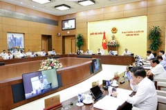 会议现场。图自越通社