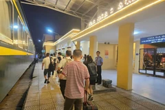 越中国际联运列车的乘客。图自越通社