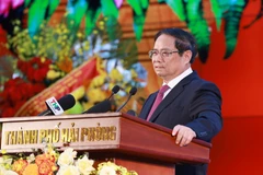 范明政总理发表讲话。图自越通社