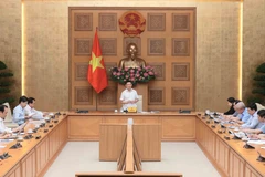 越南政府副总理、国家价格调控指导委员会主任胡德福主持召开指导委员会会议。图自越通社