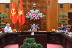 范明政总理在会上发言。图自越通社