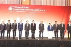 与会代表合影。图自越通社