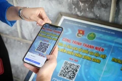 扫码了解北江省的历史遗迹。图自越通社
