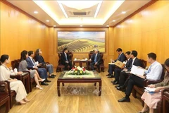 会见现场。图自越通社