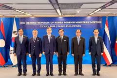 与会代表合影。图自越通社