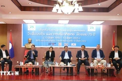 越通社驻老挝代表机构首席代表在活动上介绍越通社相关信息。图自越通社