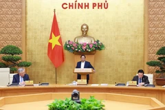 范明政总理在会上发表讲话。图自越通社