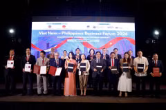 出席越南-菲律宾商务论坛的两国企业代表合影。越南化工集团供图 