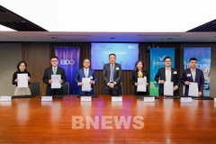 VinFast、V-Green、GSM与BDO银行的代表共同签署合作备忘录。图自越通社