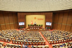 第十五届国会第九次会议闭幕.。图自越通社