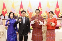 越南国家主席梁强与夫人主持国宴欢迎不丹国王吉格梅·凯萨尔·纳姆耶尔·旺楚克和王后来访。图自越通社