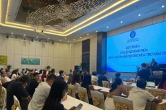 2025年秋季博览会框架内举行的货物来源研讨会。图自越通社