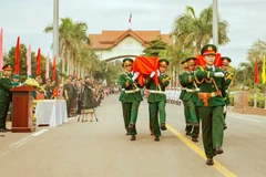 此次遗骸移交与接收仪式在庄严肃穆的气氛中进行。图自越通社