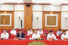 苏林总书记在会上发表讲话。图自越通社
