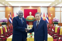 苏林总书记会见古巴全国人民政权代表大会主席兼国务委员会主席埃斯特万·拉索·埃尔南德斯。图自越通社