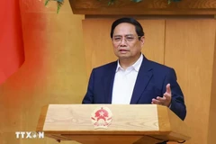范明政总理发表讲话。图自越通社