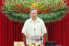 苏林总书记在会议上发表讲话。图自越通社