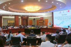 座谈会场景。图自越通社