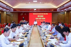 会议场景。图自越通社