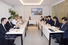 工作会谈现场。图自越通社