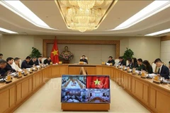 会议现场。图自越通社